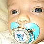 Jordan participe au concours pour gagner de l'argent avec cette photo : awake, baby, blanket, blue_pacifier, closeup, clothing, cute, face, indoor, infant, jewelry, newborn, nose, onesie, pacifier, portrait, rhinestone, skin, stitch_character, wide_eyes