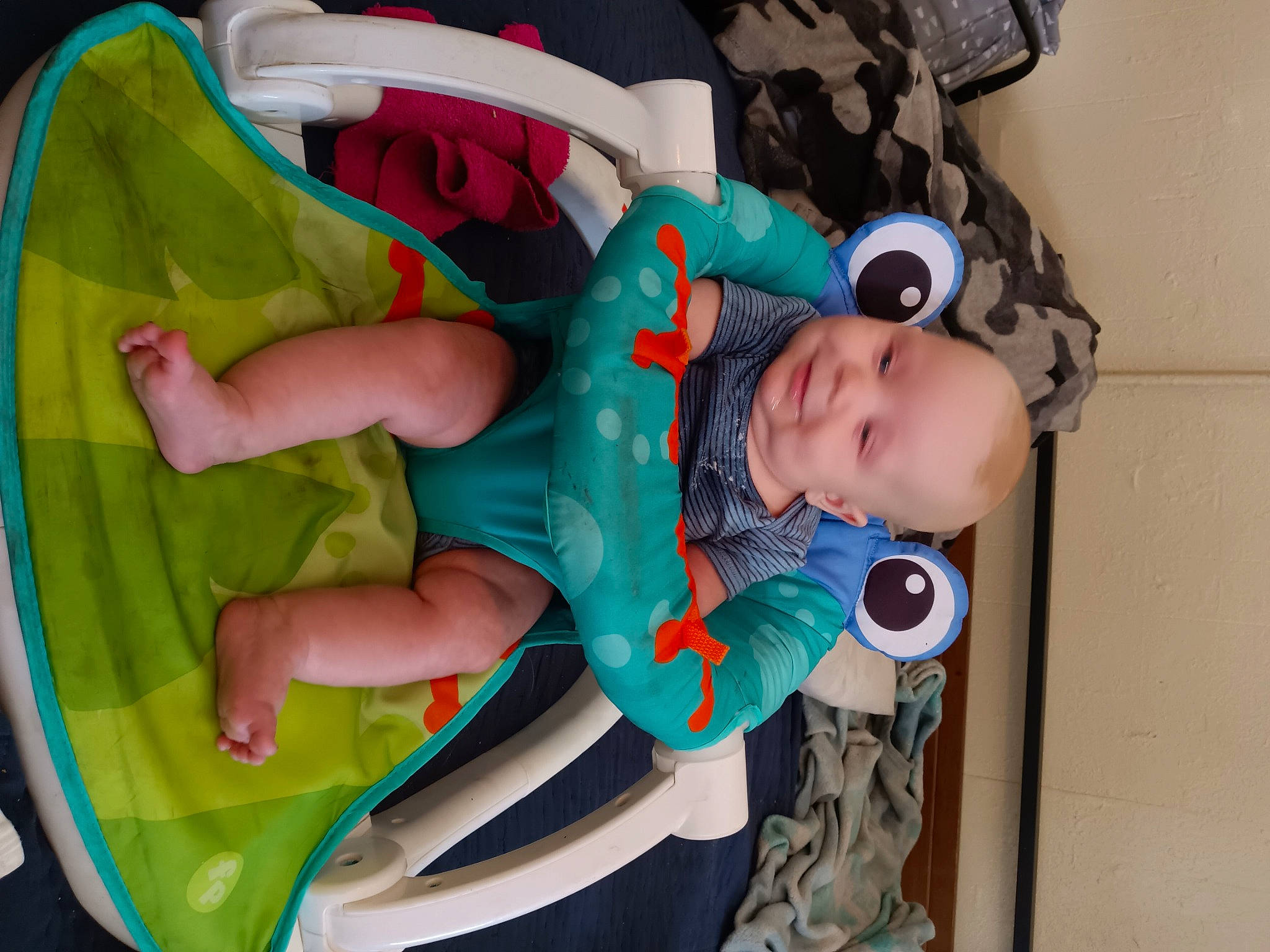 Atreyu is registered to the contest to win money with this photo: baby, baby_carriage, baby_products, baby_safety, baby_toddler_clothing, baby_toys, child, comfort, door, electric_blue, fun, happy, hat, person, pink, play, room, sitting, toddler, tree