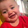 baby, child, face, smiling, indoor, curtains, red_shirt, closeup, happy, person, infant, young_child, head, cheerful, portrait, skin, eyes, mouth, teeth, candid