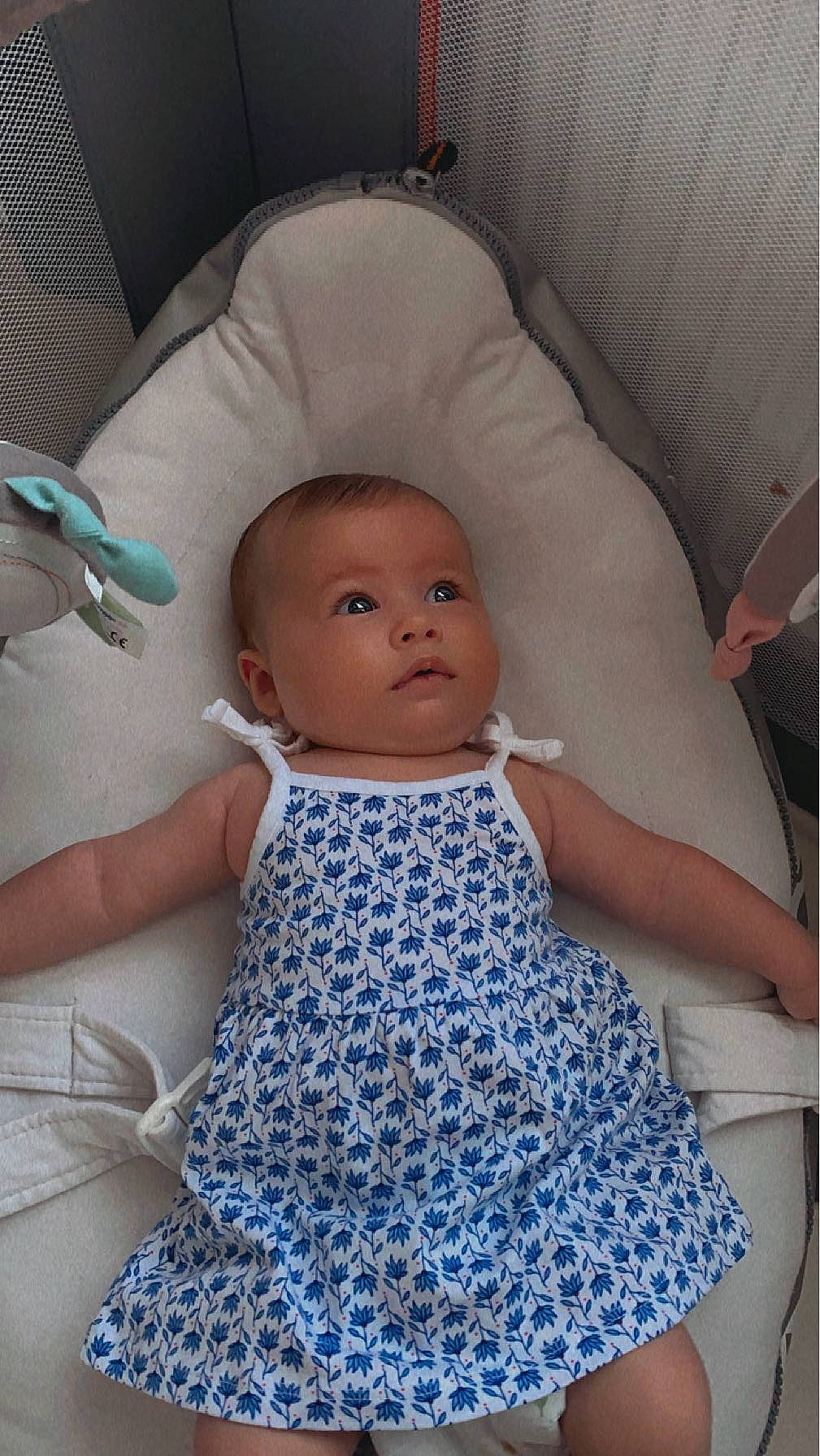 Chiara participe au concours pour gagner de l'argent avec cette photo : baby, baby_toddler_clothing, beauty, chair, child, comfort, day_dress, dress, electric_blue, face, linens, one_piece_garment, pattern, person, product, purple, sitting, skin, sleeve, textile