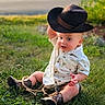 baby, boots, child, clothing, cowboy_hat, grass, greenery, infant, nature, outdoor, photography, playful, portrait, road, romper, sitting, smiling, sunlight, toddler, western