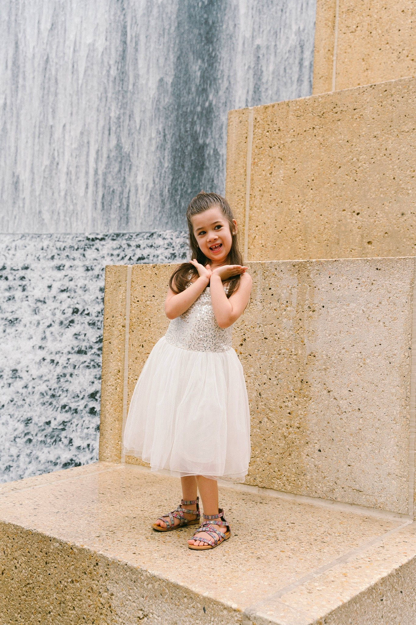 Kataleya joined the competition — help win amazing prizes! beauty, child_model, clothing, day_dress, dress, embellishment, fluid, joy, one_piece_garment, person, portrait_photography, street_fashion, water_feature, waterfall