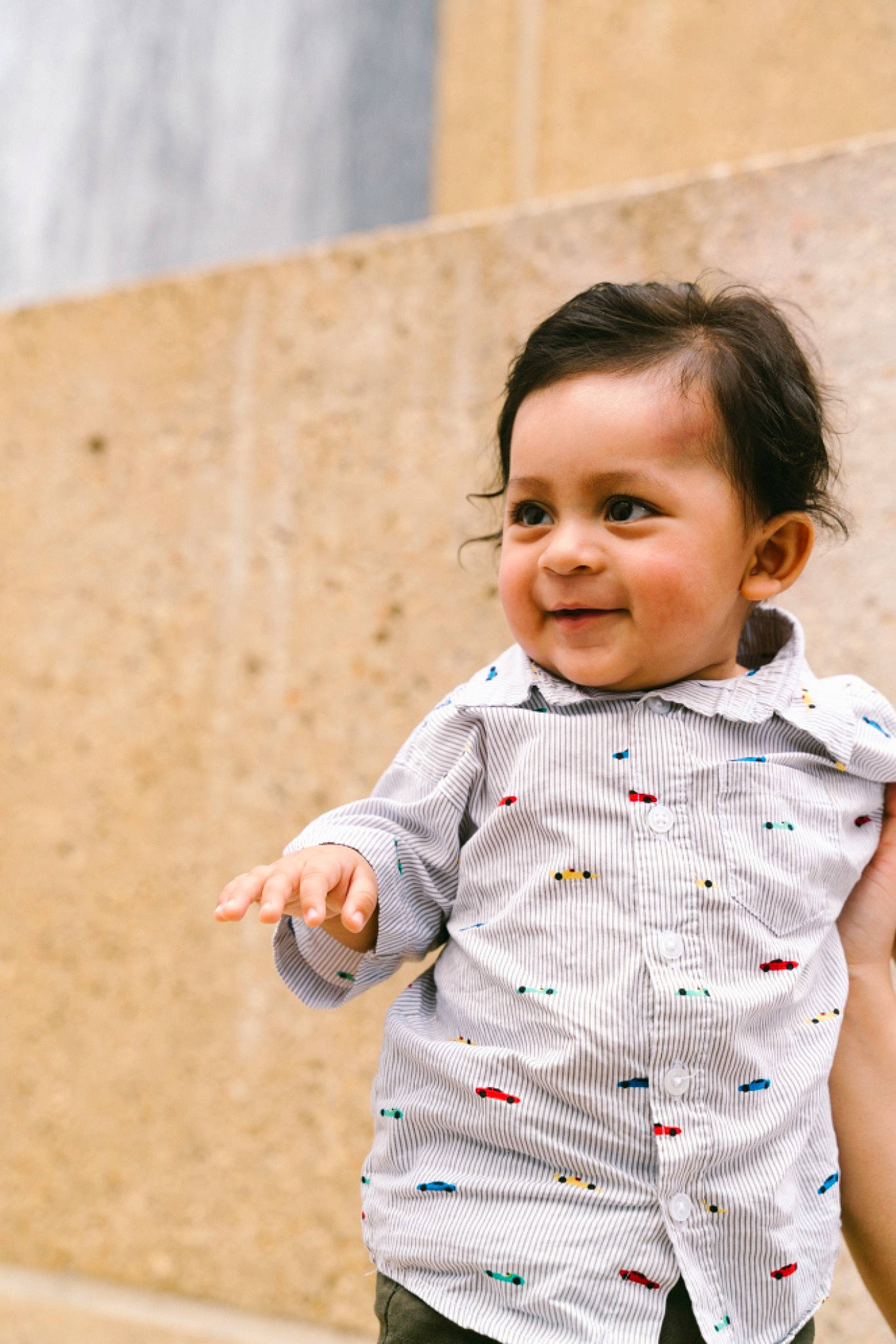 Armando is registered to the contest to win money with this photo: baby, baby_toddler_clothing, button, child, collar, joy, laugh, person, sleeve, toddler