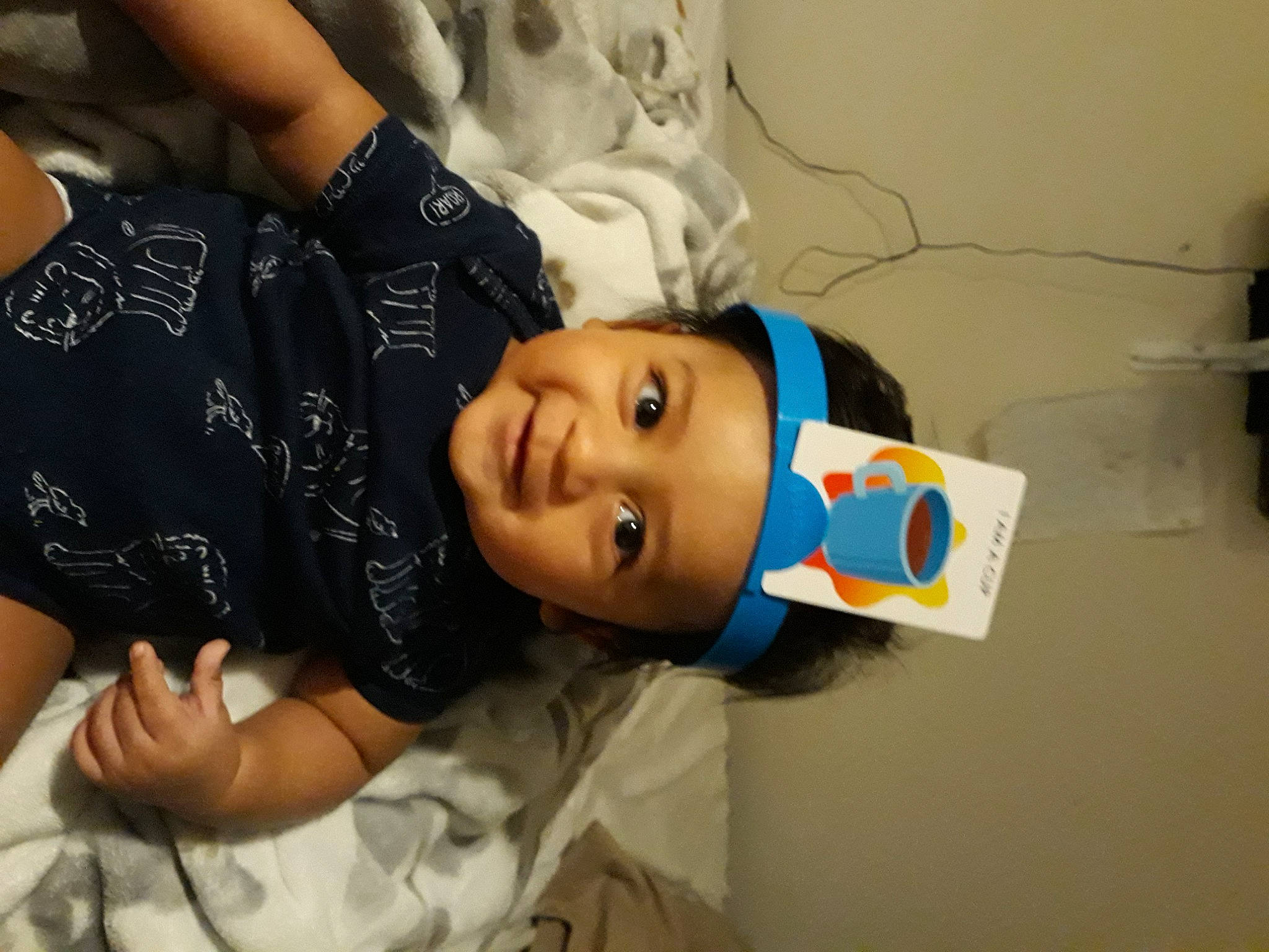 Armando is registered to the contest to win money with this photo: baby, baby_toddler_clothing, bracelet, child, headwear, joy, person, toddler
