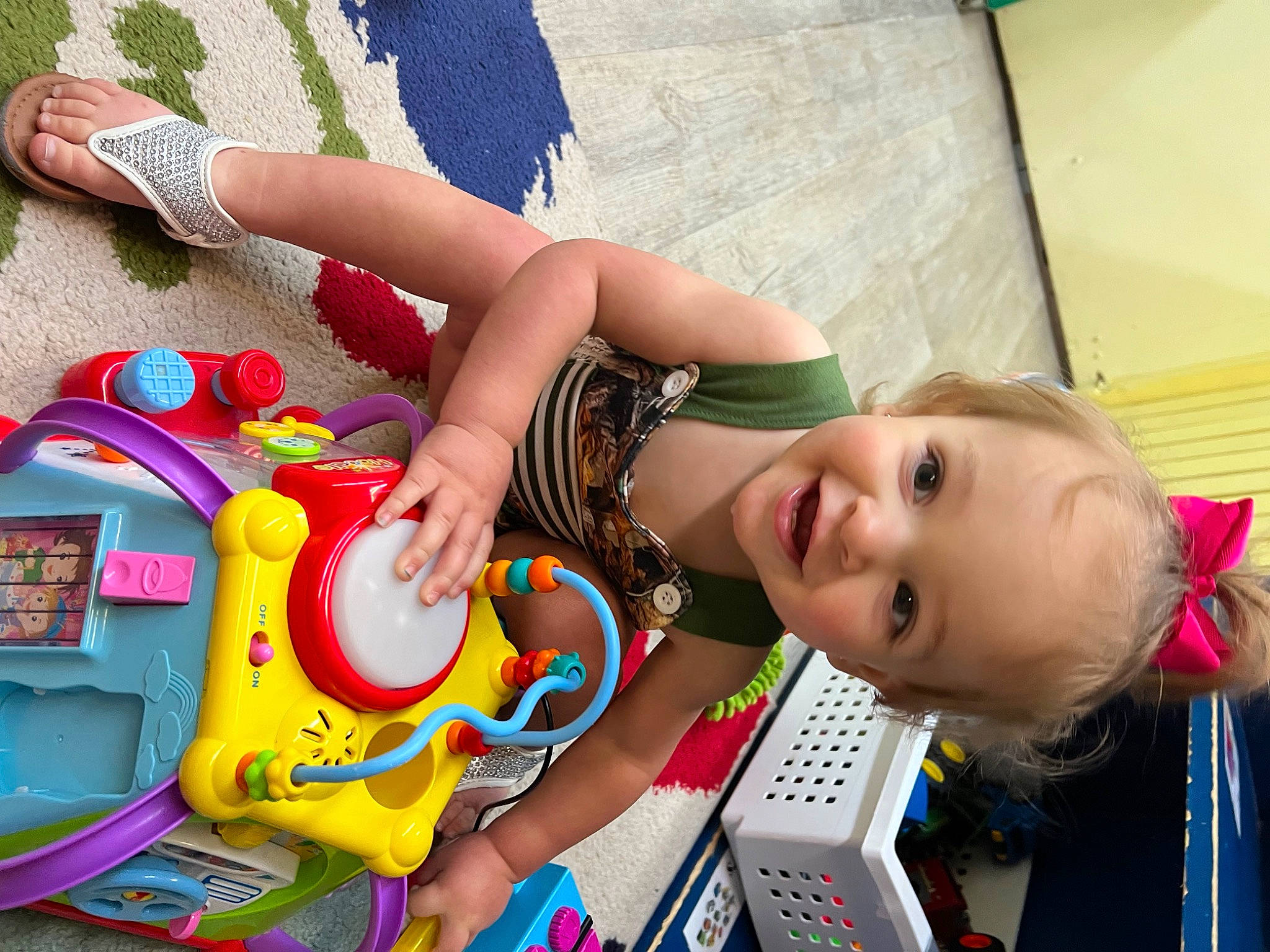 Oaklee is registered to the contest to win money with this photo: baby, baby_playing_with_toys, baby_products, baby_toys, beauty, child, foot, fun, happy, human_leg, joy, leisure, person, plastic, play, recreation, room, smile, thigh, toddler
