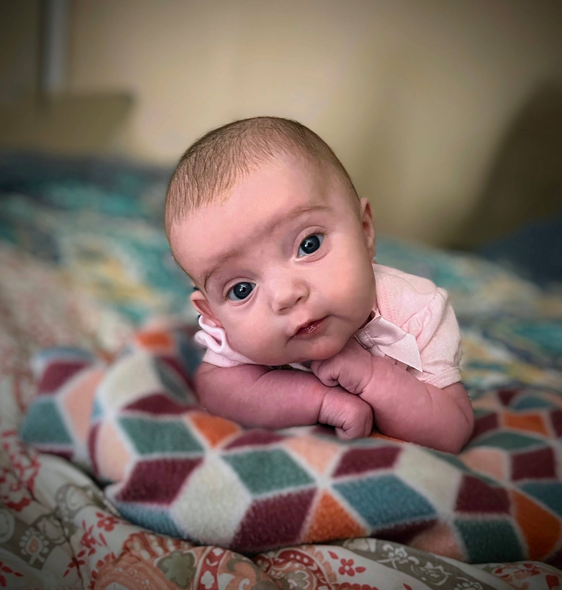 Raelyn joined the competition — help win amazing prizes! baby, baby_toddler_clothing, cheek, child, comfort, flash_photography, fun, happy, iris, linens, pattern, person, plaid, portrait_photography, room, sitting, sleeve, smile, tartan, toddler