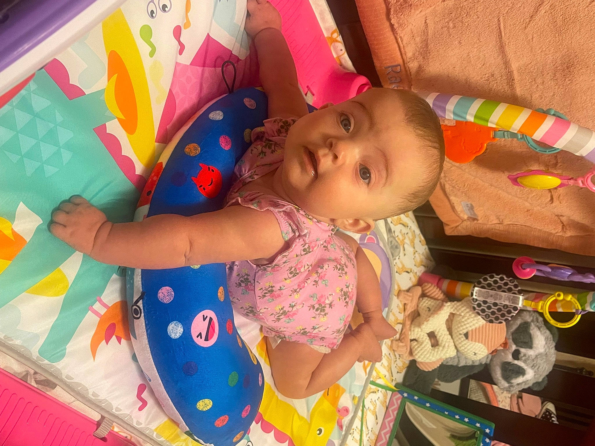 Raelyn joined the competition — help win amazing prizes! arm, baby, baby_products, baby_toddler_clothing, baby_toys, cheek, child, eye, fun, happy, pattern, person, pink, play, product, room, skin, smile, textile, toddler