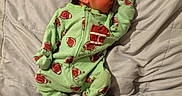 Rafael joined the competition — help win amazing prizes! newborn, baby, sleeping, onesie, green_clothing, football_pattern, blanket, soft_texture, infant, cute, peaceful, indoors, portrait, child, resting, cozy, clothing, young, sleep, babywear