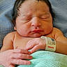 Rafael is registered to the contest to win money with this photo: newborn, baby, infant, sleeping, hospital, wristband, blanket, hand, skin, face, closed_eyes, resting, soft, cute, peaceful, portrait, indoors, child, person, newborn_baby