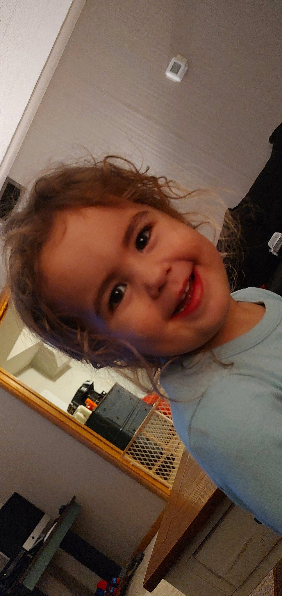 Luna is registered to the contest to win money with this photo: audio_equipment, cheek, child, eyebrow, eyelash, forehead, fun, hair_coloring, happy, joy, lip, mouth, nose, office_equipment, person, room, skin, smile, t_shirt, toddler