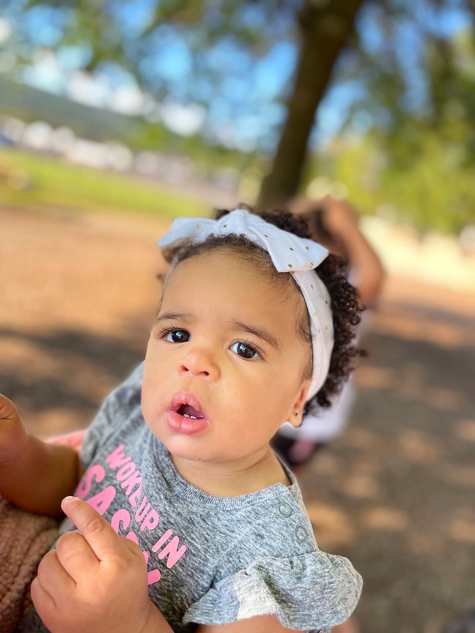 Jayleigh is registered to the contest to win money with this photo: baby, baby_toddler_clothing, chin, eye, face, finger, flash_photography, fun, grass, happy, hat, leaf, leisure, lip, people_in_nature, person, recreation, skin, sun_hat, toddler