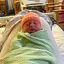 Ida joined the competition — help win amazing prizes! baby, bed, blanket, chair, curtain, furniture, hat, hospital, indoor, infant, knitted, medical_equipment, newborn, peaceful, person, room, sleeping, soft, wood, wrapped