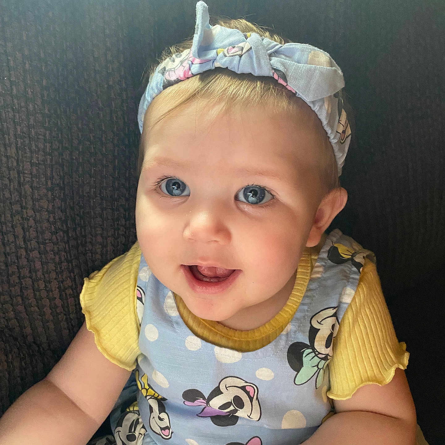 Laylah is registered to the contest to win money with this photo: accessories, baby, baseballcap, cap, clothing, cushion, dress, face, happy, hat, head, homedecor, jewelry, necklace, person, photography, portrait, sitting, smile, t_shirt