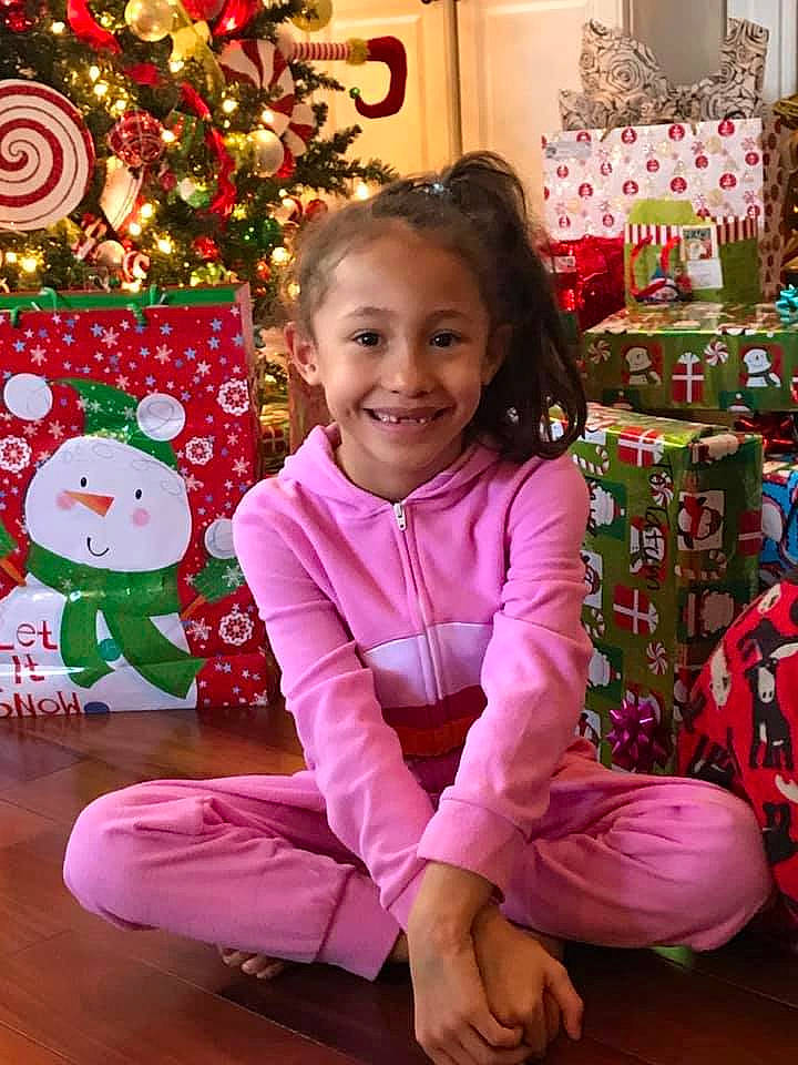 Tatum joined the competition — help win amazing prizes! child, christmas, christmas_decoration, christmas_eve, christmas_ornament, christmas_tree, happy, holiday, interior_design, joy, person, pink, play, smile, toddler