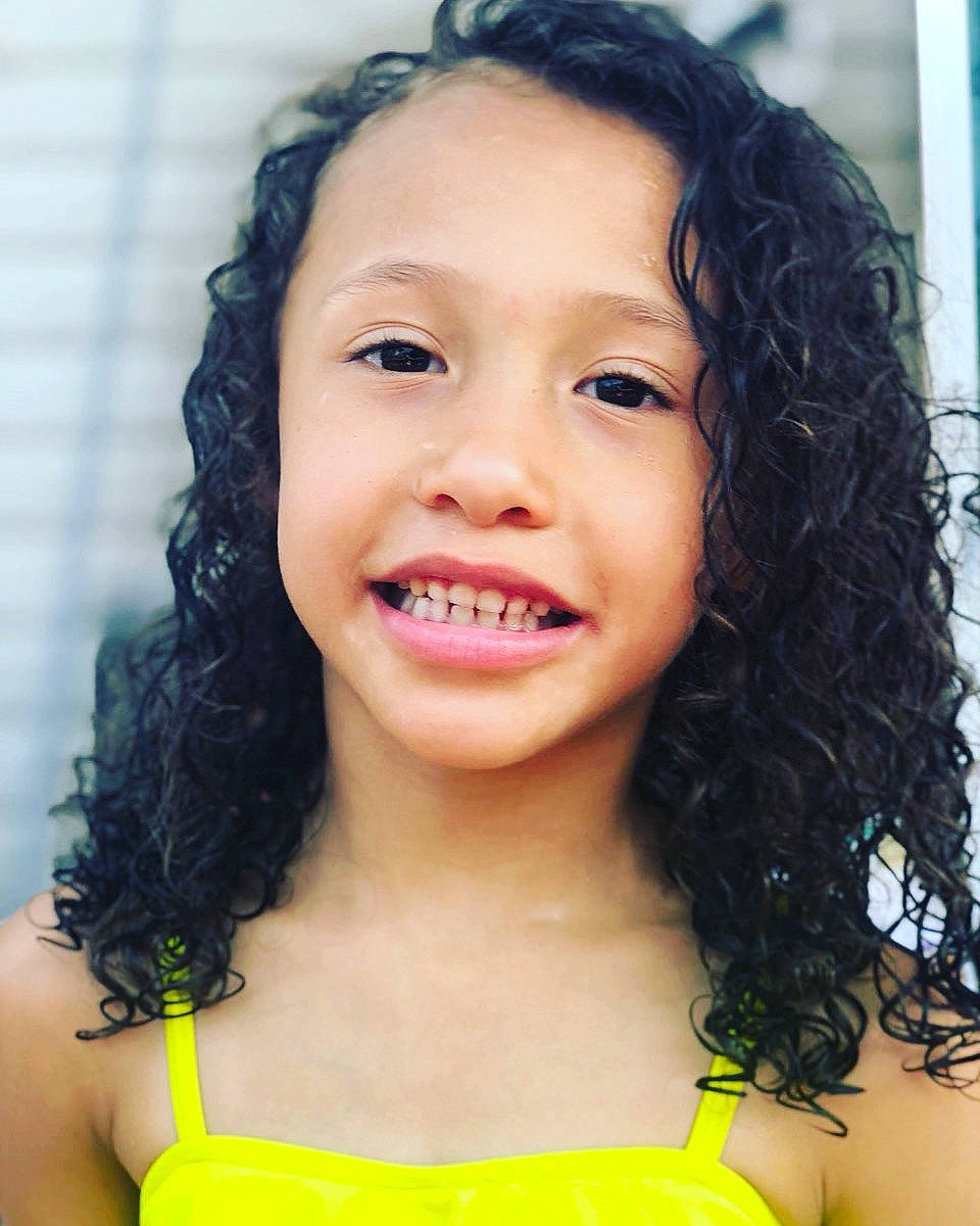 Tatum is registered to the contest to win money with this photo: beauty, black_hair, child, child_model, chin, eyebrow, face, facial_expression, forehead, hair, hairstyle, happy, human, joy, lip, long_hair, mouth, nose, person, skin