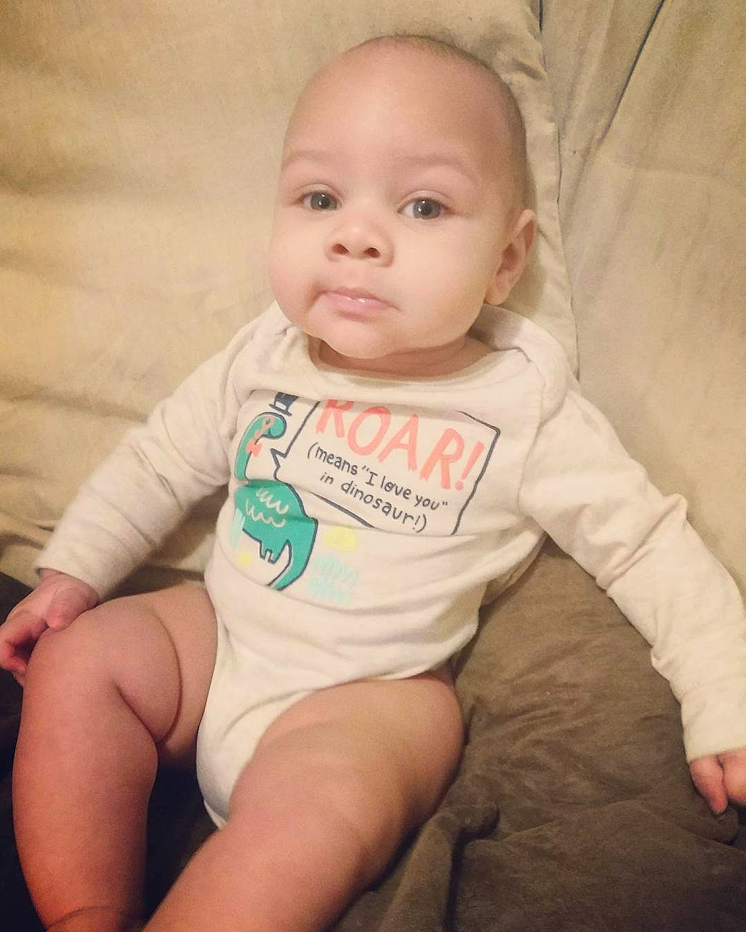 Davien is registered to the contest to win money with this photo: arm, baby_products, cheek, child, child_model, day, finger, hand, human_hair_color, infant, iris, mouth, person, product, sitting, skin, smile, toddler