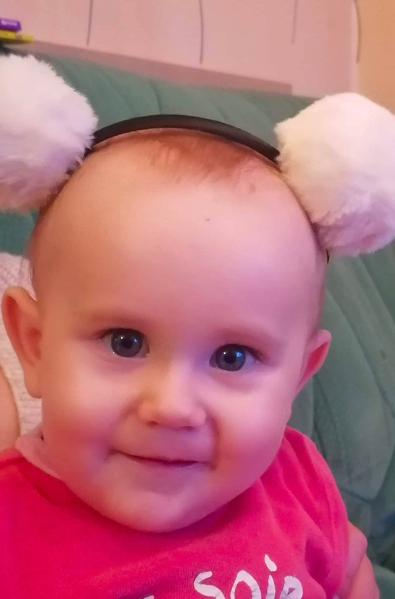 Abby participe au concours pour gagner de l'argent avec cette photo : baby, baby_toddler_clothing, cheek, child, ear, eye, eyebrow, eyelash, forehead, fun, happy, headgear, iris, joy, lip, magenta, nose, person, pink, skin