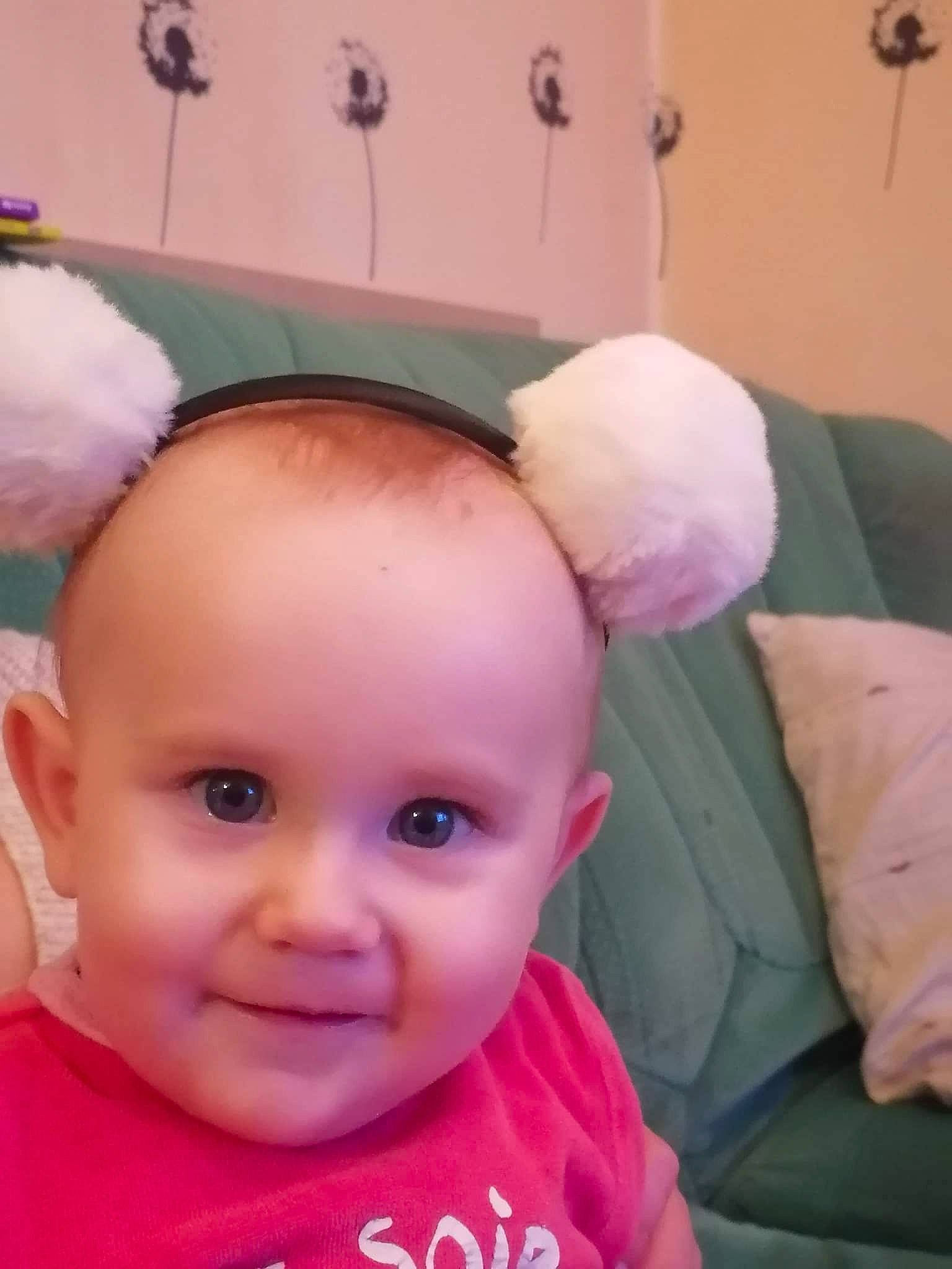 Abby participe au concours pour gagner de l'argent avec cette photo : baby, baby_products, baby_toddler_clothing, cheek, child, ear, eyelash, face, finger, fun, gesture, happy, joy, magenta, nose, person, pink, skin, smile, t_shirt