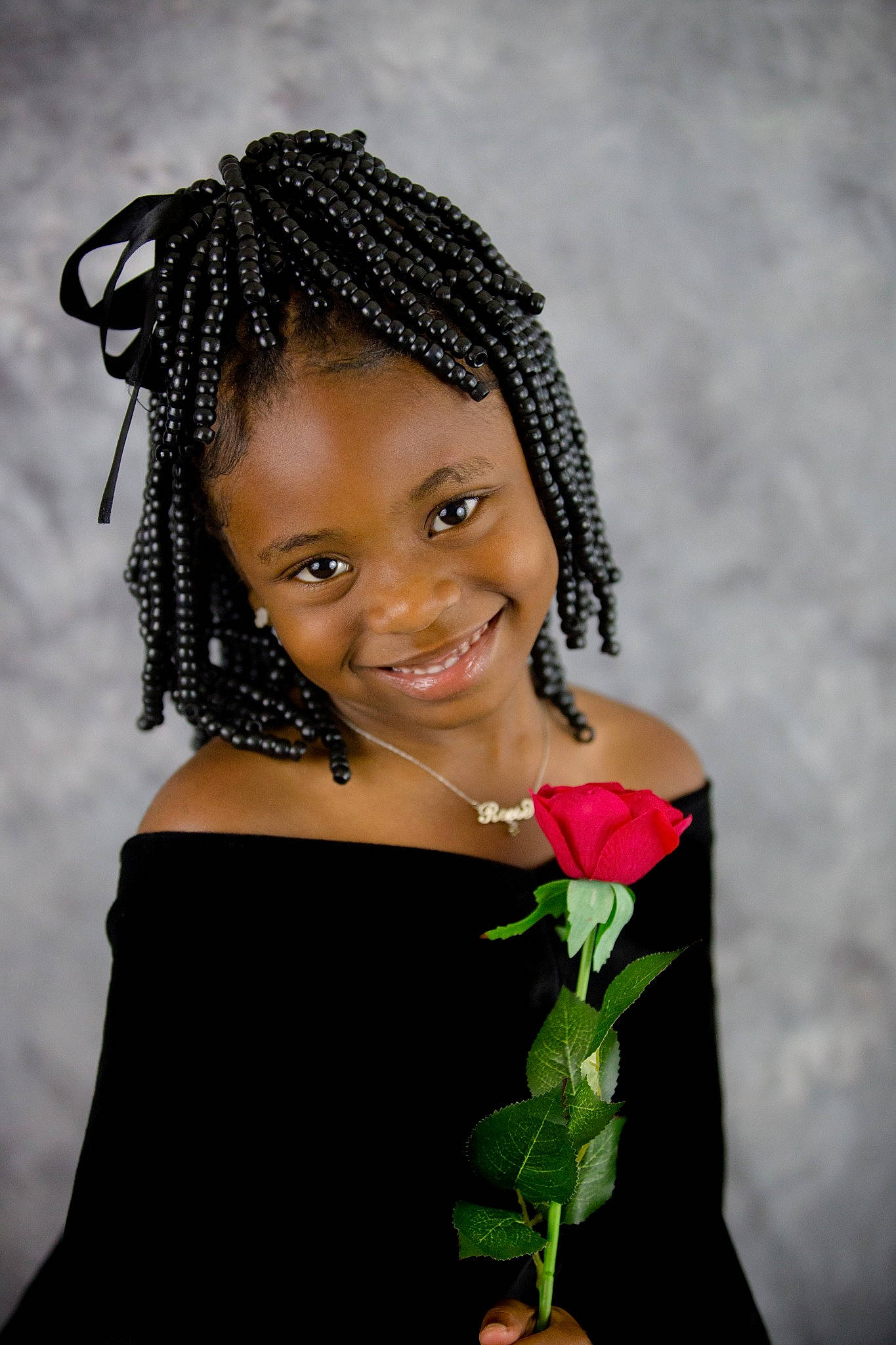 Reese is registered to the contest to win money with this photo: beauty, black, black_hair, bridal_accessory, child, child_model, dress, eye, fashion_accessory, flash_photography, hair, hair_accessory, hairstyle, headpiece, joy, lip, long_hair, person, photo_shoot, photography