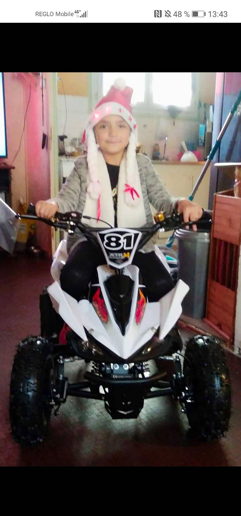 Lana participe au concours pour gagner de l'argent avec cette photo : alloy_wheel, automotive_design, automotive_exhaust, automotive_exterior, automotive_lighting, automotive_tire, bumper, fender, headlamp, headwear, joy, motor_vehicle, motorcycle, motorcycle_accessories, motorsport, person, racing, rim, smile, spoke