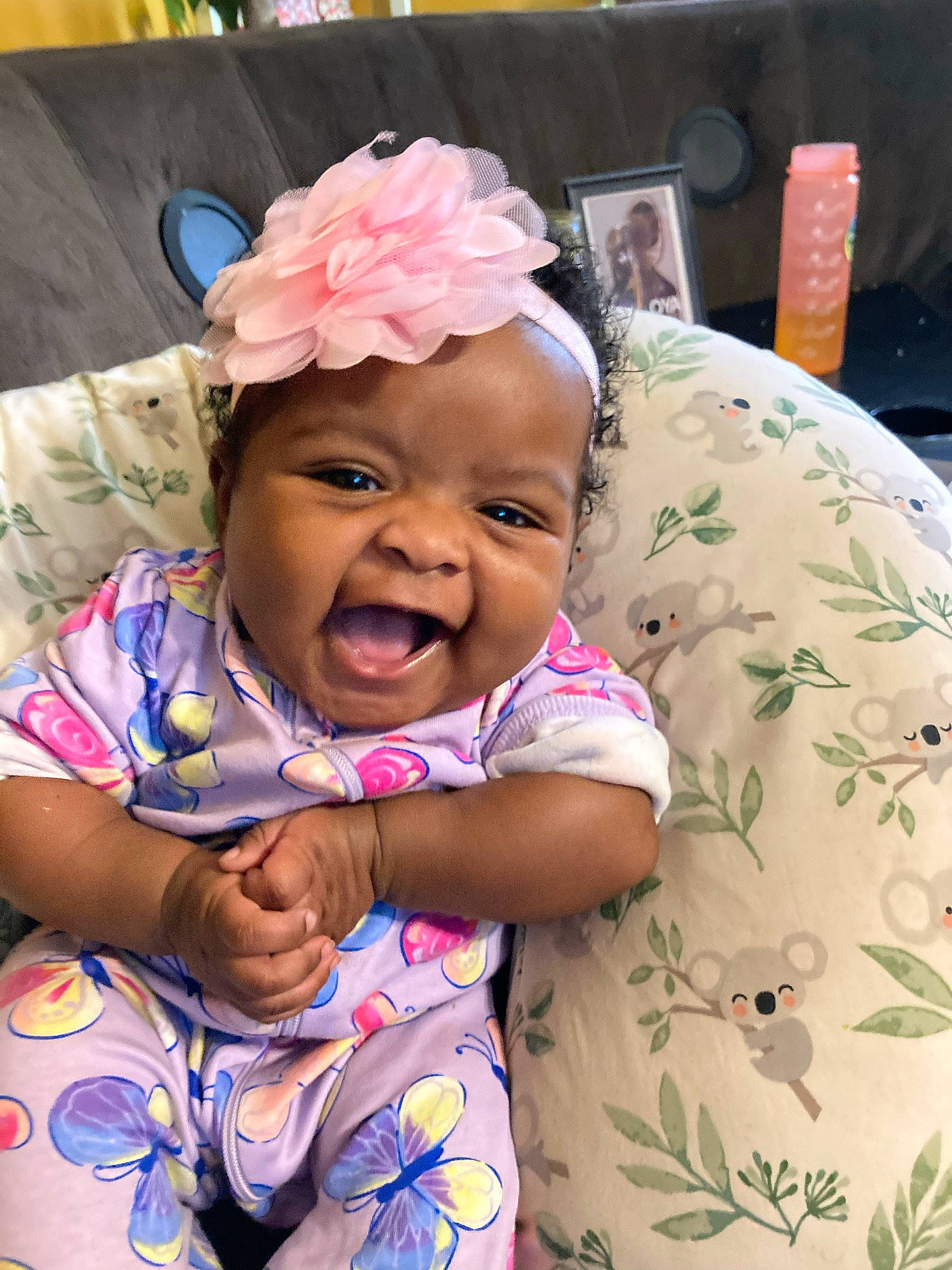 Nyla Oshun joined the competition — help win amazing prizes! baby, baby_toddler_clothing, cheek, child, event, face, fashion_accessory, fun, happy, hat, head, headwear, iris, linens, magenta, person, petal, pink, purple, skin