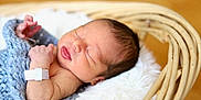 Miguel joined the competition — help win amazing prizes! newborn, baby, sleeping, blanket, blue, basket, wicker, infant, cozy, hospital_bracelet, skin, face, hand, cute, soft, white_cushion, peaceful, resting, indoors, portrait