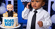 Joao Julian joined the competition — help win amazing prizes! baby, child, cake, balloons, party, black_tie, white_shirt, phone, table, celebration, indoor, portrait, standing, decorations, black_and_white, figurine, background, smile, person, event