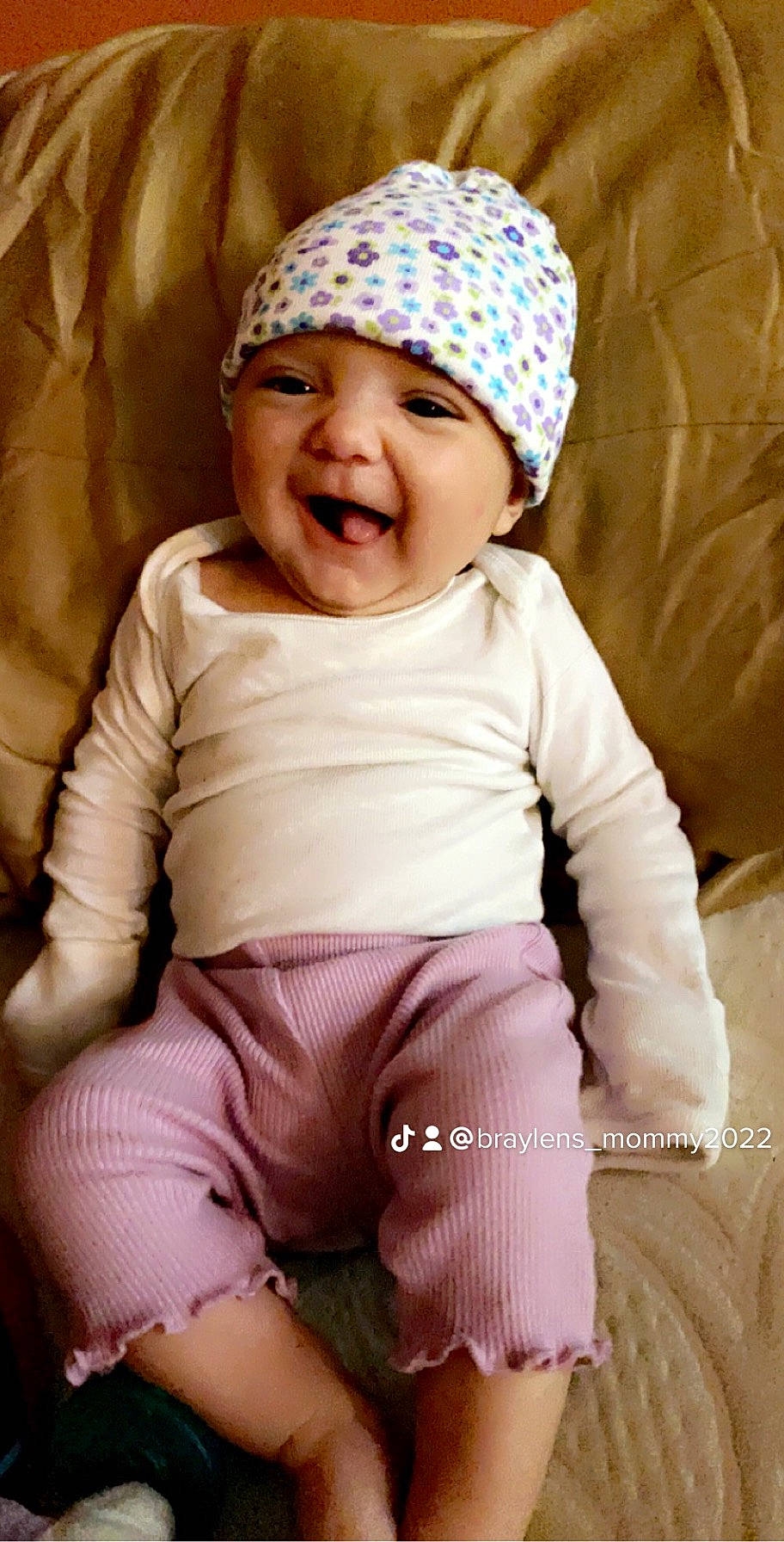 Braylen is registered to the contest to win money with this photo: baby, baby_toddler_clothing, cap, clothing, eye, face, happy, head, headgear, headwear, human_body, lip, magenta, person, pink, purple, skin, sleeve, smile, standing