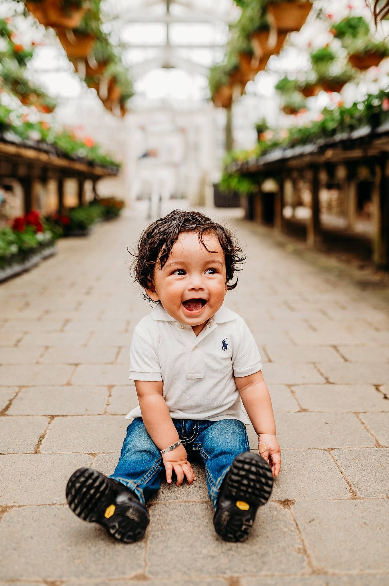 Elias is registered to the contest to win money with this photo: baby, baby_toddler_clothing, beauty, child, flooring, fun, hairstyle, happy, jeans, leisure, people, person, plant, skin, smile, snapshot, standing, summer, toddler, travel