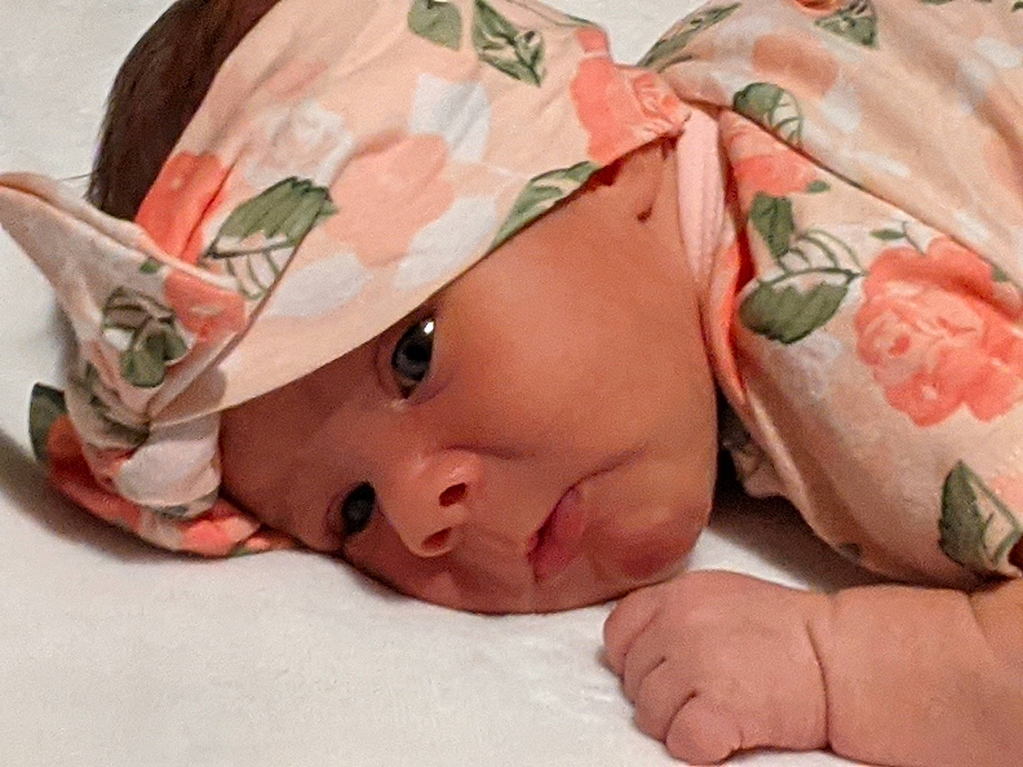 Kristen is registered to the contest to win money with this photo: baby, baby_products, baby_toddler_clothing, bedding, bedtime, cap, cheek, child, comfort, fashion_accessory, flesh, happy, headgear, headwear, linens, pattern, peach, person, pink, skin