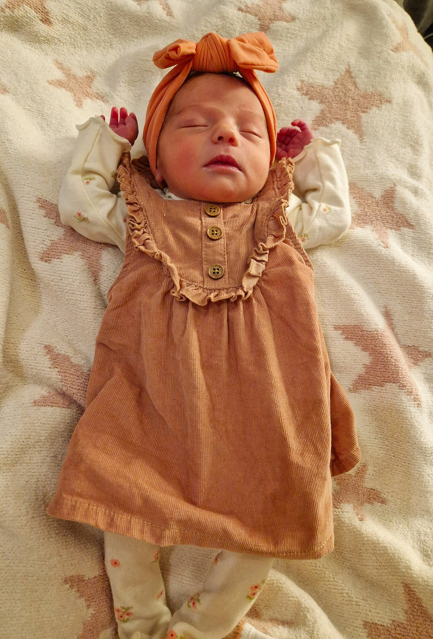 Evie is registered to the contest to win money with this photo: baby, baby_sleeping, baby_toddler_clothing, beige, cheek, comfort, costume, face, fur, headgear, hood, jacket, linens, pattern, peach, person, pink, skin, sleeve, textile
