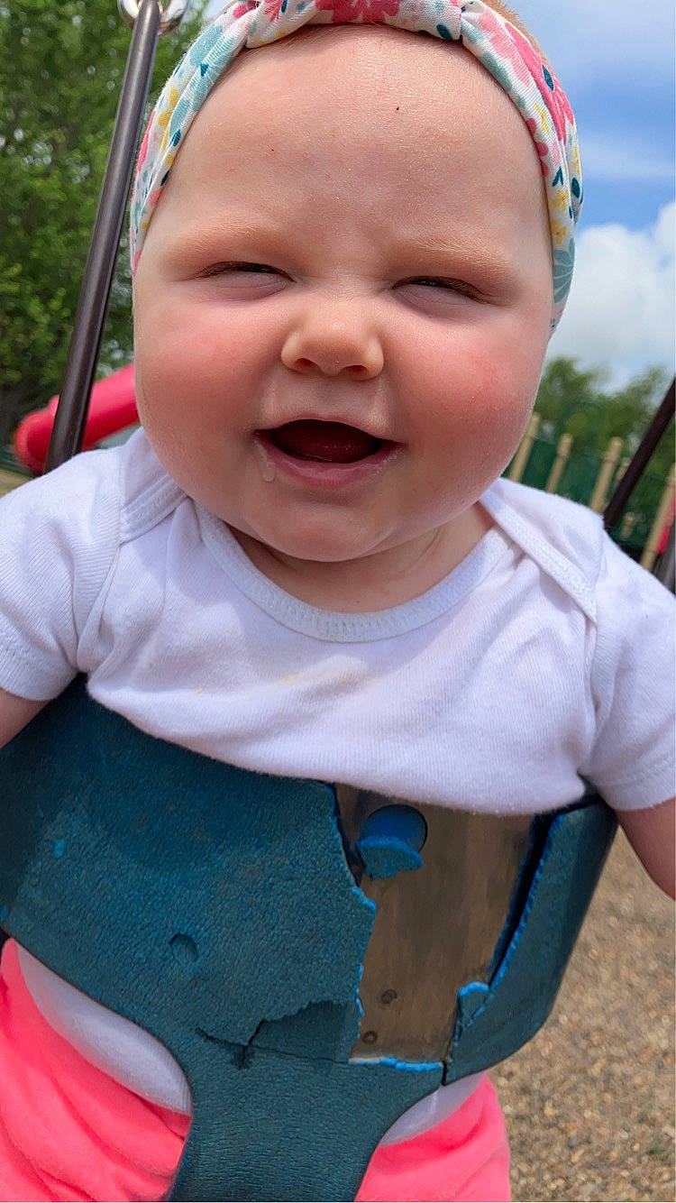 Brynleigh joined the competition — help win amazing prizes! baby_toddler_clothing, blue, cheek, child, eye, face, facial_expression, fun, grass, happy, iris, joy, lip, nose, person, photograph, pink, red, skin, sleeve