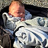 Ezyo a rejoint le concours — aidez-le/la à gagner de superbes lots ! baby, blanket, closeup, clothing, cozy, face, gravel, head, infant, jacket, outdoor, person, portrait, resting, sleepy, soft, stroller, sunlight, warm, wrapped