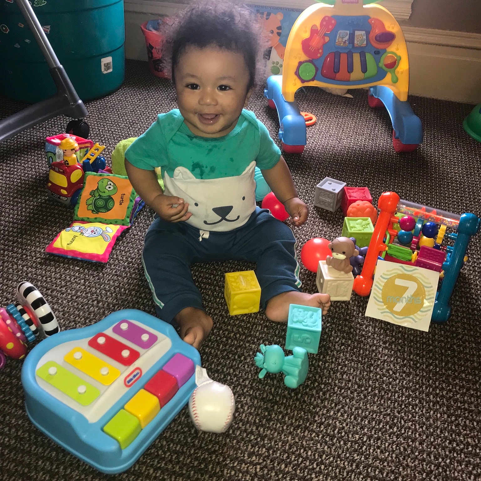 Jakobe is registered to the contest to win money with this photo: baby, baby_toys, child, fun, games, joy, learning, person, play, playset, toddler, toy, toy_block