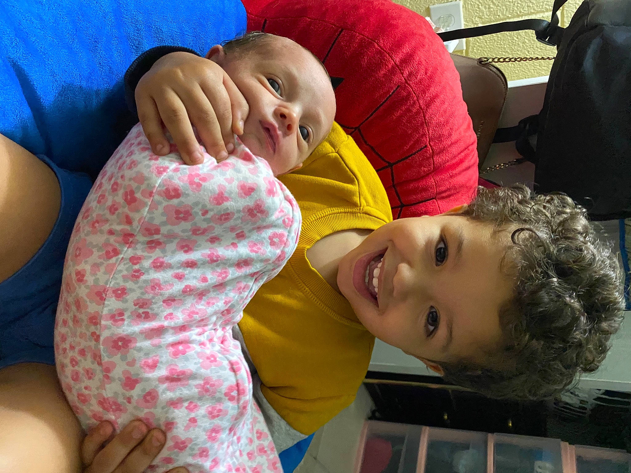 Clover is registered to the contest to win money with this photo: abdomen, baby, cheek, child, comfort, couch, fun, gesture, grass, happy, joy, laugh, leisure, mouth, nose, person, room, sitting, skin, sleep