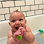 baby, bathing, bathtub, biting, bodypart, eating, face, finger, food, hand, happy, head, mouth, person, photography, pool, portrait, smile, teeth, tub