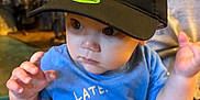 Apollo James Menton joined the competition — help win amazing prizes! applique, baby, baseballcap, beanie, bodypart, cap, clothing, face, finger, furniture, hand, hat, head, pattern, person, photography, portrait, shelf, sunhat, t_shirt