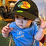 applique, baby, baseballcap, beanie, bodypart, cap, clothing, face, finger, furniture, hand, hat, head, pattern, person, photography, portrait, shelf, sunhat, t_shirt