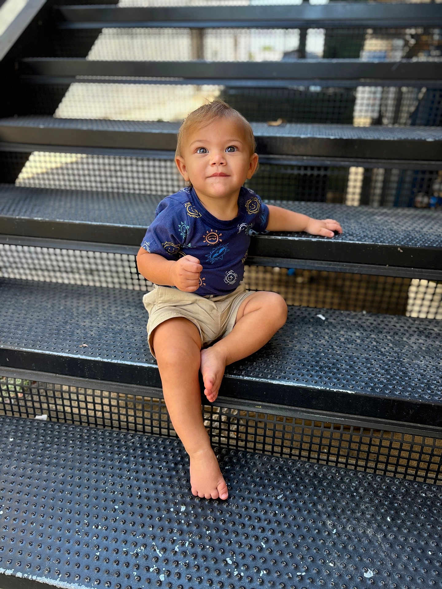 Apollo James Menton is registered to the contest to win money with this photo: architecture, bodypart, boy, building, child, clothing, face, finger, head, house, housing, jeans, male, pants, person, photography, portrait, shorts, sitting, staircase