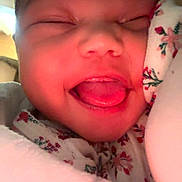 Sequoia joined the competition — help win amazing prizes! baby, closeup, face, smiling, tongue_out, blanket, floral_pattern, cozy, infant, cute, happy, sleepwear, soft, child, portrait, skin, mouth, expression, warm, comfort