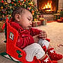Sequoia is registered to the contest to win money with this photo: baby, sleeping, christmas_tree, fireplace, presents, carpet, holiday, knitted, sleigh, red_clothing, socks, indoors, decorations, festive, cozy, child, celebration, warmth, relaxation, seasonal