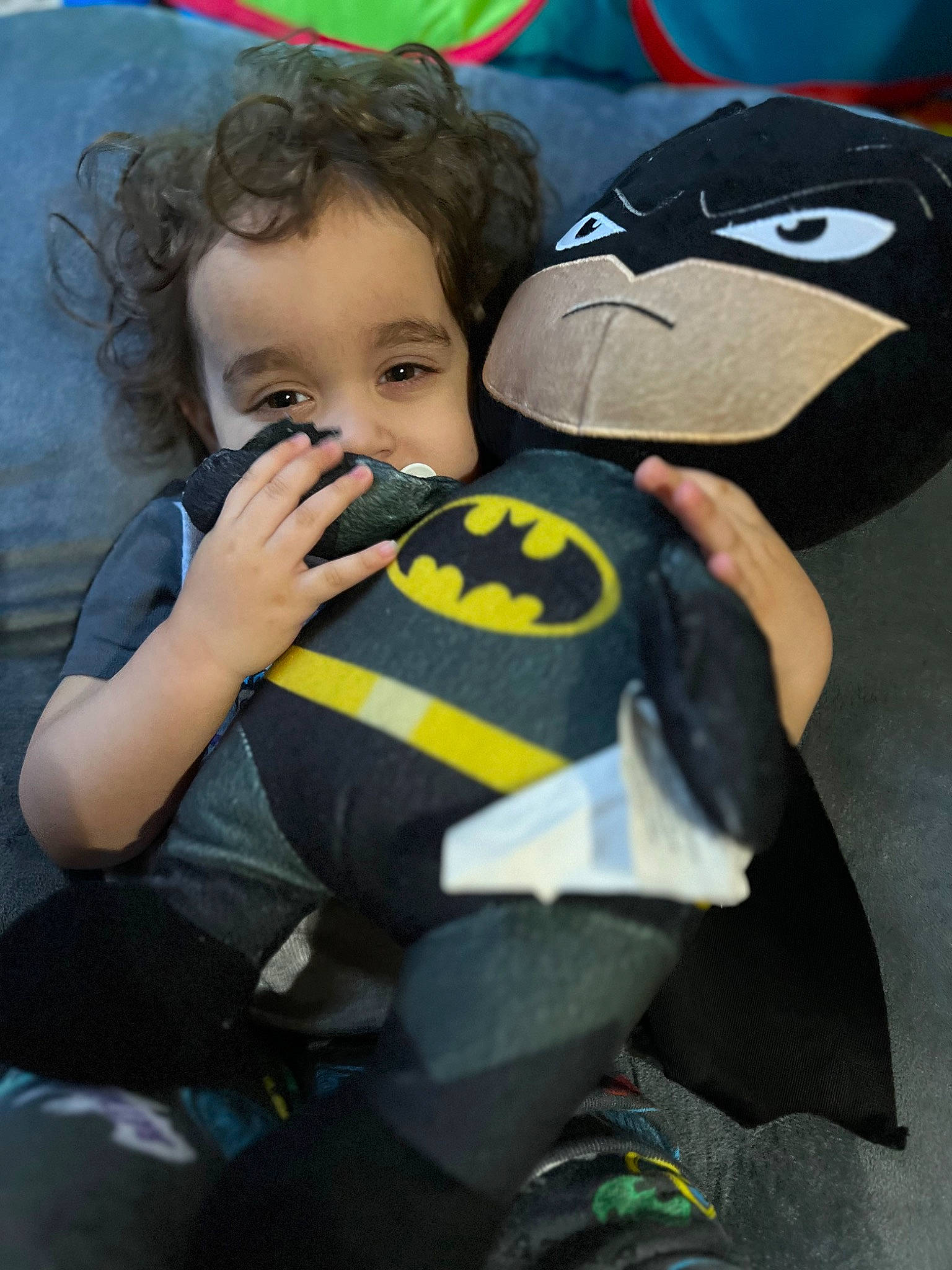 Xavier is registered to the contest to win money with this photo: baby, baby_products, baby_toddler_clothing, child, comfort, fictional_character, finger, fun, happy, head, hug, person, personal_protective_equipment, plush, room, sitting, snapshot, stuffed_toy, thumb, toddler