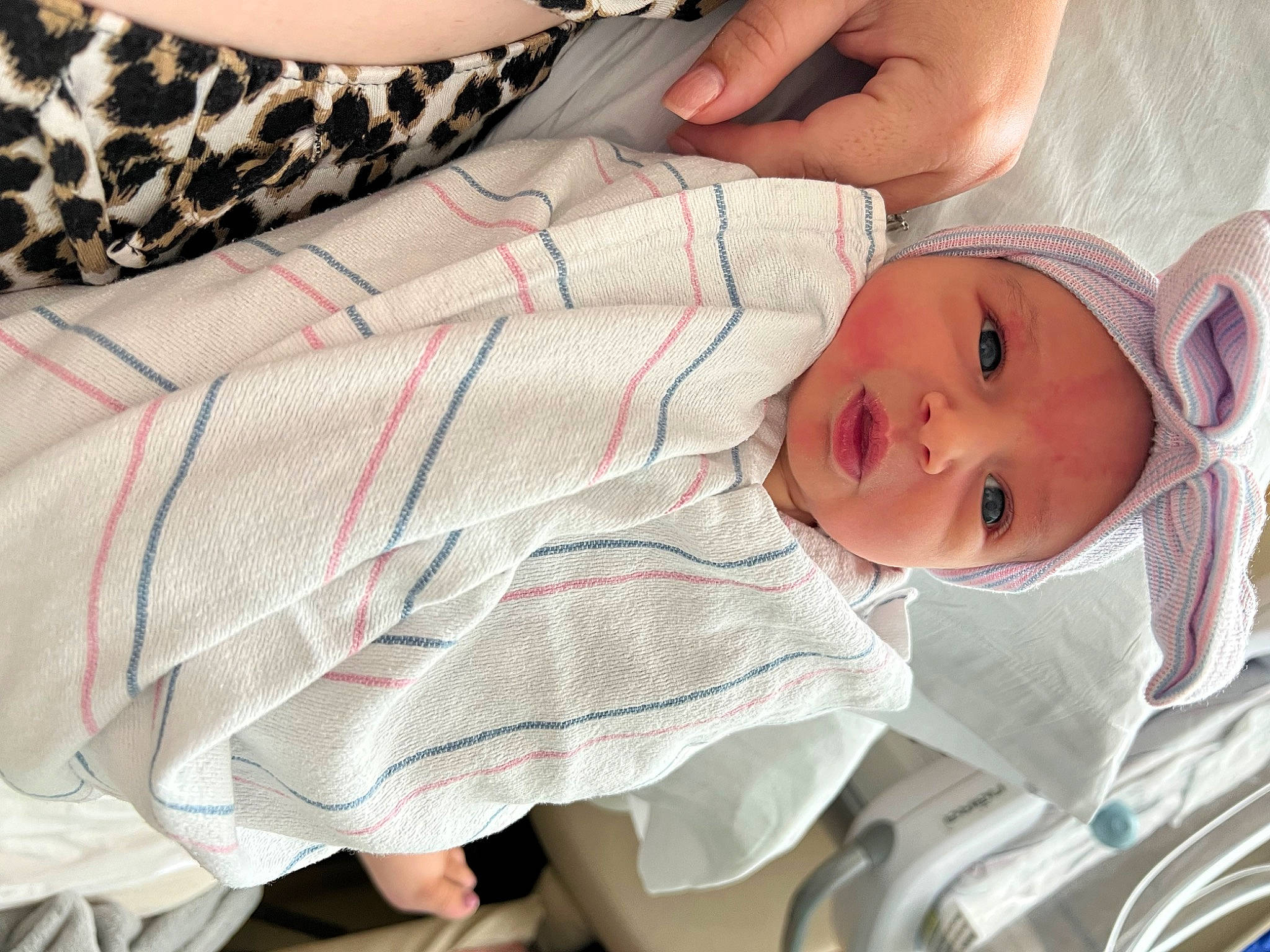 Lainey joined the competition — help win amazing prizes! baby, baby_products, baby_toddler_clothing, bedding, child, comfort, happy, hat, headwear, linens, pattern, person, plaid, room, skin, sleeve, smile, tartan, textile, toddler