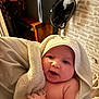 Luna participe au concours pour gagner de l'argent avec cette photo : baby, blanket, child, cozy, curious, cute, expression, face, fan, furniture, hand, hood, indoor, infant, newborn, portrait, skin, soft, towel, wrapped