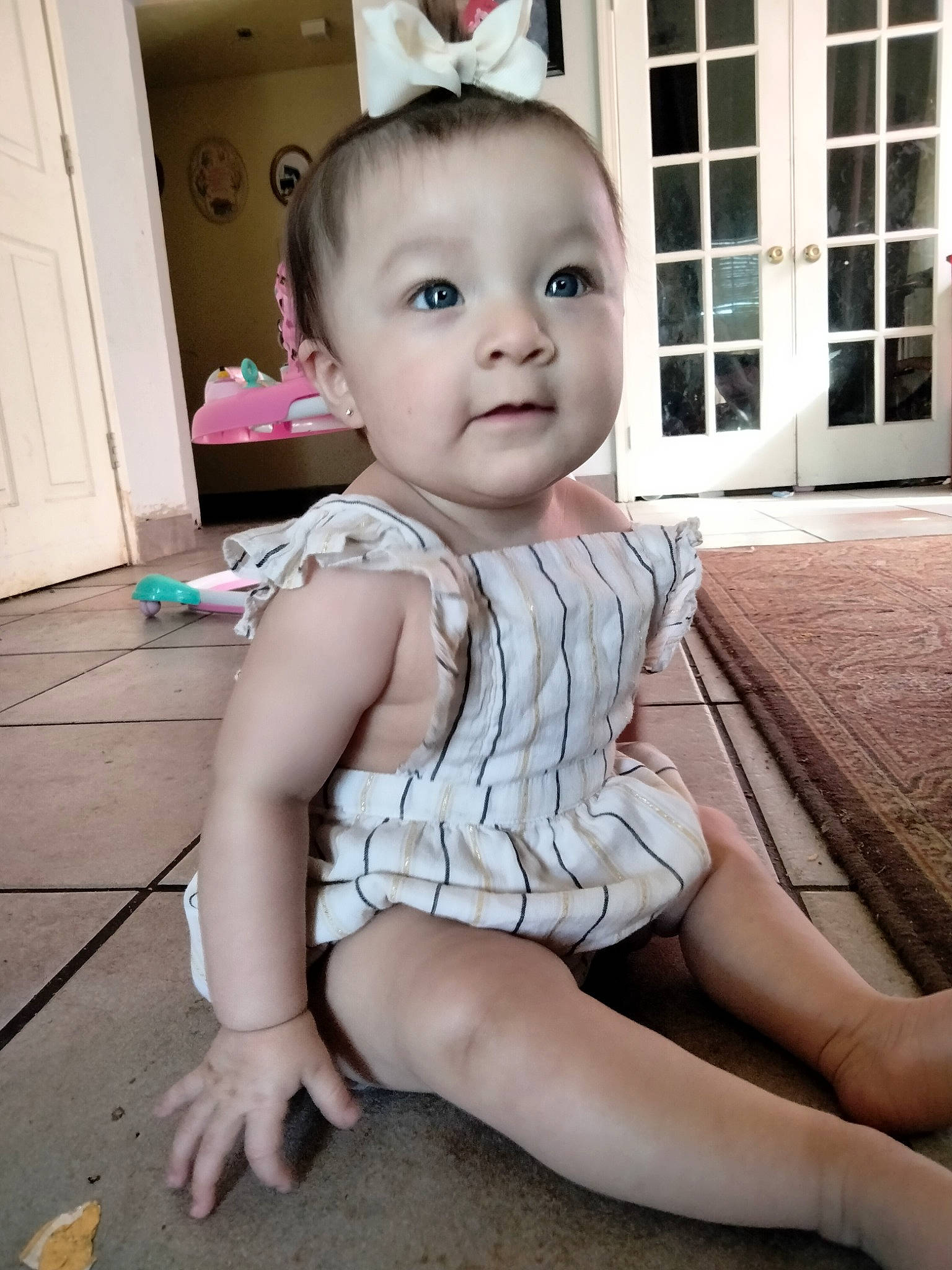 Eva joined the competition — help win amazing prizes! baby, baby_toddler_clothing, cheek, door, eye, eyebrow, eyelash, face, floor, flooring, happy, head, human_leg, iris, nose, person, pink, skin, thigh, toddler