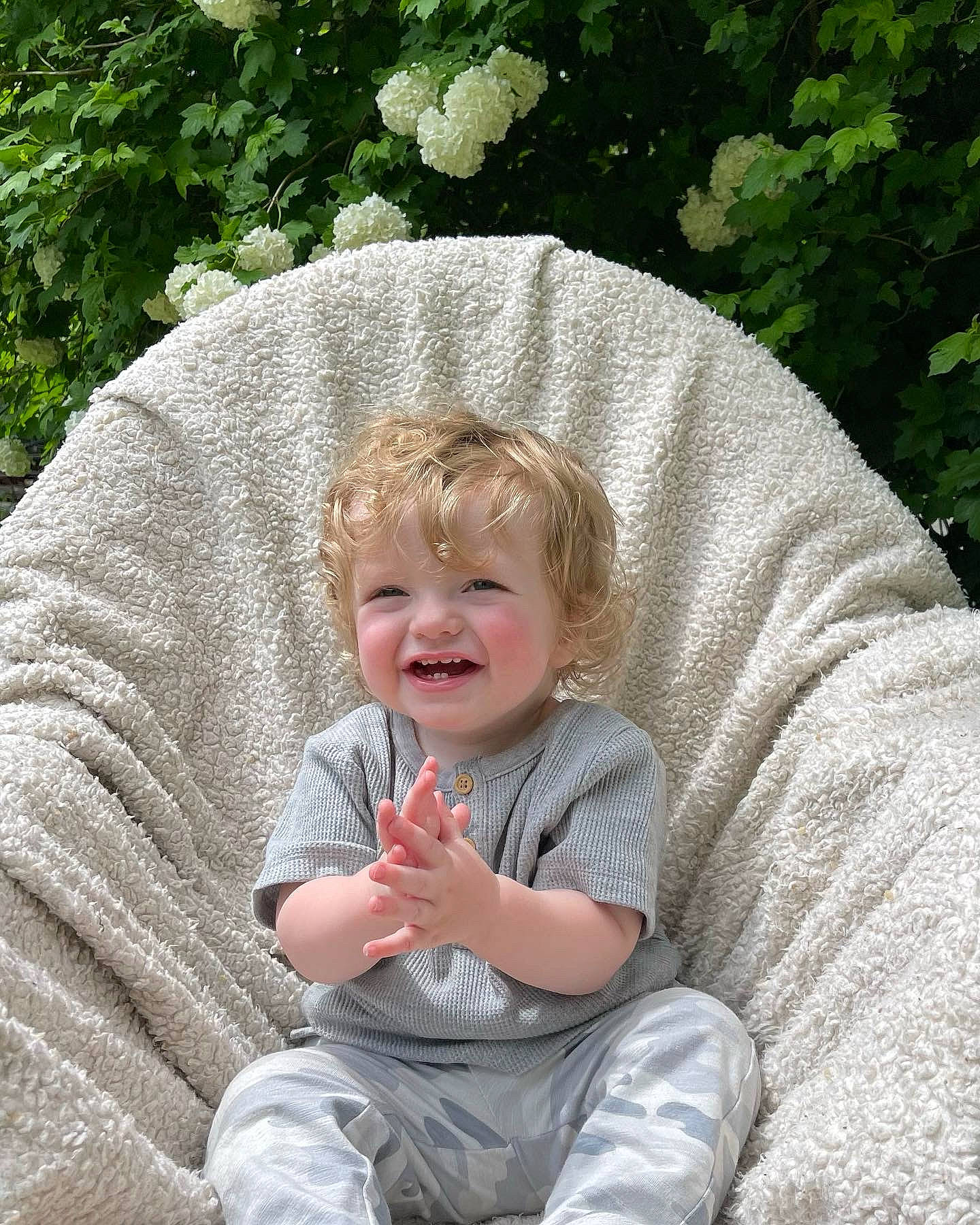 Landon joined the competition — help win amazing prizes! baby, baby_toddler_clothing, child, chin, comfort, eye, fun, grass, hair, happy, head, joy, leisure, people_in_nature, person, plant, sitting, skin, sleeve, smile