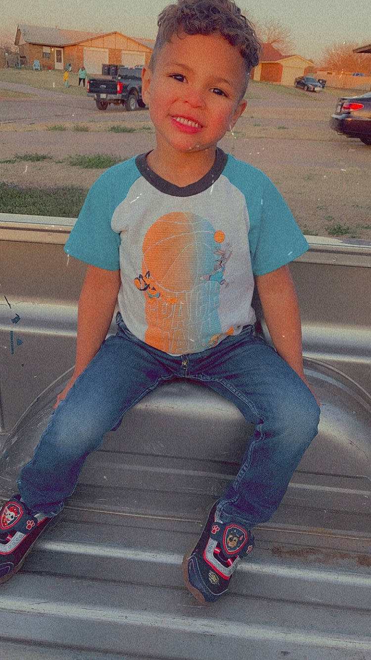 Aaron joined the competition — help win amazing prizes! cool, denim, facial_expression, hairstyle, happy, jeans, joy, leg, leisure, lip, mouth, orange, person, photograph, pink, plant, red, shoe, sleeve, smile