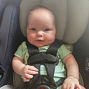 Cody joined the competition — help win amazing prizes! baby, car_seat, child, infant, harness, graco, seat_belt, safety, cute, face, hand, clothing, green_shirt, indoor, portrait, young_child, infant_baby, seat, baby_holding, child_safety