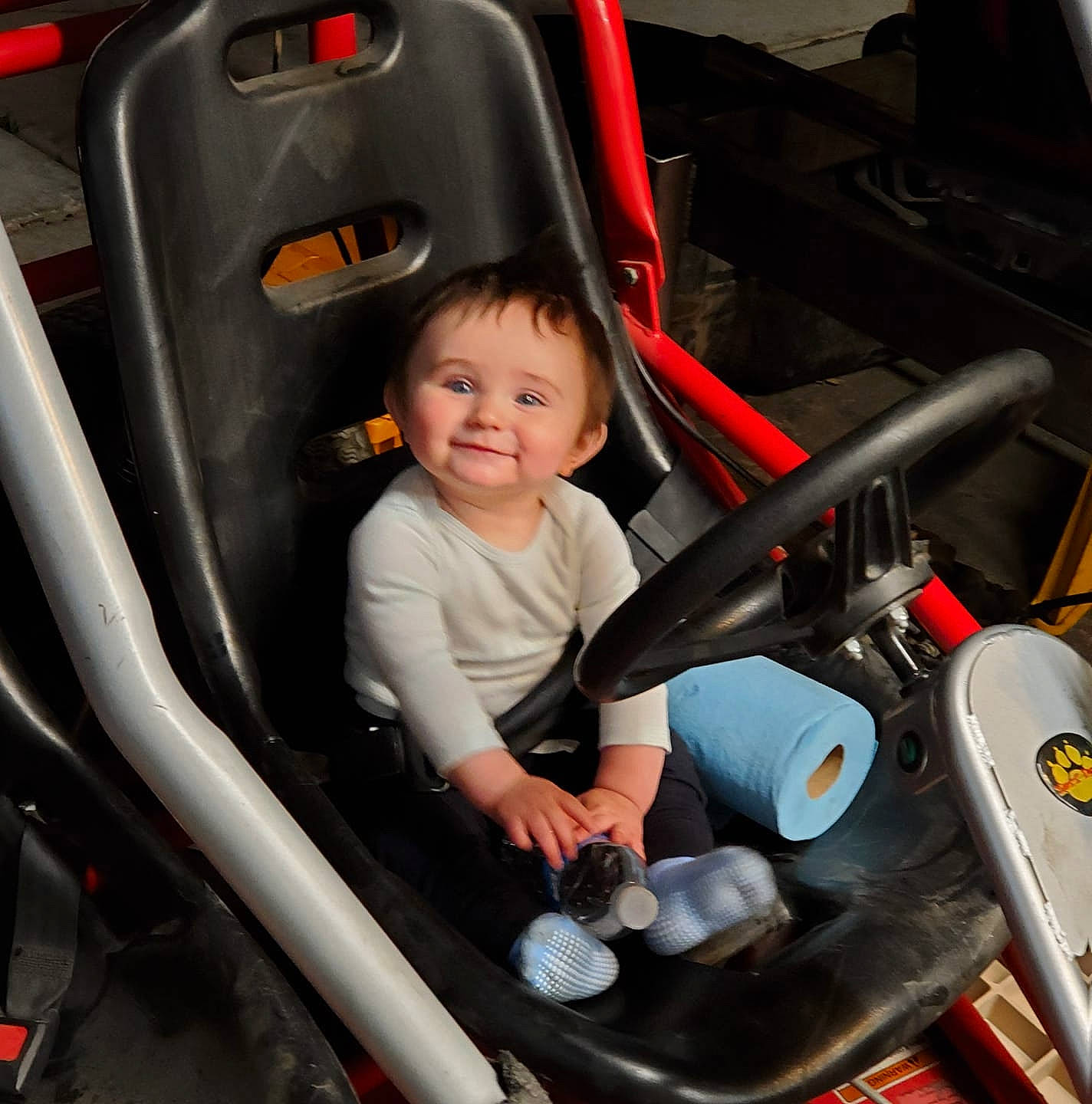 Dillon joined the competition — help win amazing prizes! auto_part, automotive_exterior, car, car_seat, child, driving, joy, luxury_vehicle, motor_vehicle, person, steering_wheel, vehicle, vehicle_door