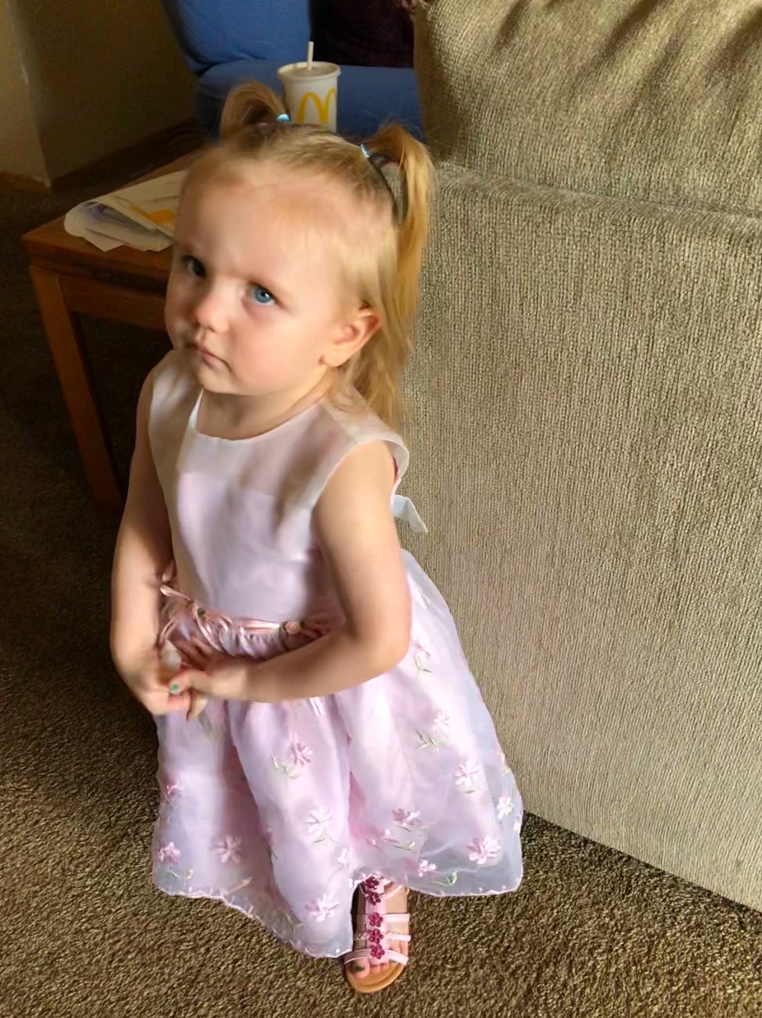 Paisley is registered to the contest to win money with this photo: baby, blond, child, dress, iris, person, pink, play, sitting, skin, smile, standing, toddler, vacation